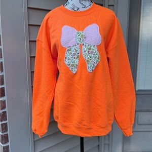 Orange Sweatshirt with Quilted Floral Bow Design